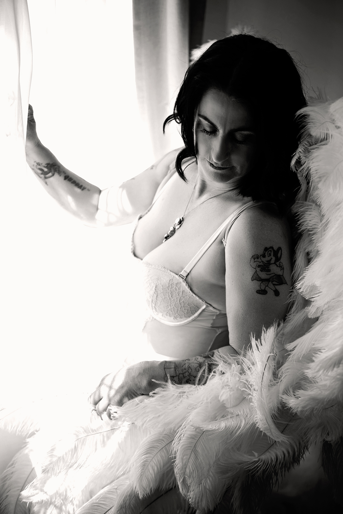 White angel wings boudoir session